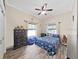 Cozy bedroom with a full-size bed and ample closet space at 807 Virginia Ave, Tarpon Springs, FL 34689