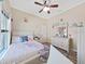 Charming bedroom with a double bed and dresser at 807 Virginia Ave, Tarpon Springs, FL 34689