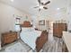 Large main bedroom with a king-size bed and ensuite bathroom at 807 Virginia Ave, Tarpon Springs, FL 34689