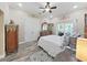 Bright main bedroom with king-size bed and walk-in closet at 807 Virginia Ave, Tarpon Springs, FL 34689