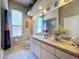 Bathroom with shower, vanity, and toilet at 8284 Cockatoo Rd, Weeki Wachee, FL 34613