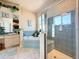 Spa-like bathroom with soaking tub, walk-in shower, and dual sinks at 8284 Cockatoo Rd, Weeki Wachee, FL 34613