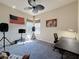 Bedroom with desk, window, and ceiling fan at 8284 Cockatoo Rd, Weeki Wachee, FL 34613