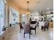 Bright breakfast nook with bay window and view of the pool at 8284 Cockatoo Rd, Weeki Wachee, FL 34613