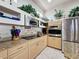 Well-equipped kitchen with granite countertops and stainless steel appliances at 8284 Cockatoo Rd, Weeki Wachee, FL 34613