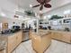 Spacious kitchen featuring granite counters, island, and stainless steel appliances at 8284 Cockatoo Rd, Weeki Wachee, FL 34613