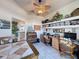 Home office with built-in shelving and two work stations at 8284 Cockatoo Rd, Weeki Wachee, FL 34613