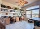 Home office with built-in shelving and two work stations at 8284 Cockatoo Rd, Weeki Wachee, FL 34613
