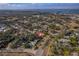 Aerial view showing a single-Gathering home's location within a residential neighborhood at 905 Palm Blvd, Dunedin, FL 34698