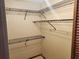 Walk-in closet with wire shelving at 9179 Gillmar St, Spring Hill, FL 34608