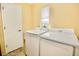 Laundry room with Samsung washer and dryer at 9240 Tiara Ct, New Port Richey, FL 34655