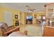 Spacious living room featuring ample natural light and comfortable furnishings at 9240 Tiara Ct, New Port Richey, FL 34655