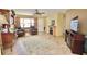 Bright and airy living room with a comfortable seating area and a fireplace at 9240 Tiara Ct, New Port Richey, FL 34655
