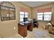 Home office with built-in desk and lake view at 9240 Tiara Ct, New Port Richey, FL 34655