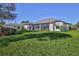 House with large backyard and screened lanai at 9694 Southern Belle Dr, Weeki Wachee, FL 34613