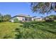 House with screened patio and spacious backyard at 9694 Southern Belle Dr, Weeki Wachee, FL 34613