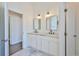 Bathroom boasting dual vanities with granite countertops at 9694 Southern Belle Dr, Weeki Wachee, FL 34613
