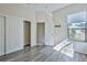 Spacious bedroom with double closets and wood flooring at 9694 Southern Belle Dr, Weeki Wachee, FL 34613