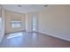 Bedroom featuring hardwood floors and access to a patio at 9694 Southern Belle Dr, Weeki Wachee, FL 34613
