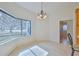 Breakfast nook showcasing a view and access to a nearby bathroom at 9694 Southern Belle Dr, Weeki Wachee, FL 34613