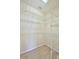 Walk-in closet with wire shelving and hanging rods at 9694 Southern Belle Dr, Weeki Wachee, FL 34613