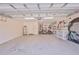 Garage with golf cart and workshop area at 9694 Southern Belle Dr, Weeki Wachee, FL 34613