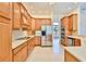 Well-equipped kitchen, featuring ample cabinetry and stainless steel appliances at 9694 Southern Belle Dr, Weeki Wachee, FL 34613