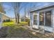 A cozy enclosed patio extends onto the backyard, offering a relaxing outdoor area at 11637 Spindrift Loop, Hudson, FL 34667