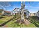 This home has a well-maintained backyard with lovely mature trees at 11637 Spindrift Loop, Hudson, FL 34667