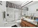 Neutral colored bathroom featuring a granite countertop, and a glass enclosed shower at 11637 Spindrift Loop, Hudson, FL 34667