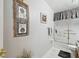 Neutral colored bathroom featuring tile flooring, and a glass enclosed shower at 11637 Spindrift Loop, Hudson, FL 34667