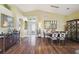Inviting dining area with hardwood floors, open to living spaces at 11637 Spindrift Loop, Hudson, FL 34667