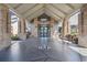 The beautifully designed entrance with a covered drive offers a grand welcome to residents and guests at 11637 Spindrift Loop, Hudson, FL 34667