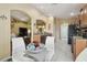 Bright and airy kitchen, seamlessly connected with eat-in kitchen area at 11637 Spindrift Loop, Hudson, FL 34667
