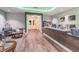 Inviting lobby area with modern flooring, reception desk, and comfortable seating, creating a welcoming atmosphere at 11637 Spindrift Loop, Hudson, FL 34667