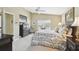 Relaxing main bedroom with a ceiling fan, closet and carpeted floor at 11637 Spindrift Loop, Hudson, FL 34667