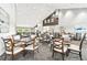 Large restaurant space showcasing abundant seating, neutral colors, and modern lighting for versatile use at 11637 Spindrift Loop, Hudson, FL 34667