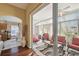 Bright sun room with tile floors, lots of windows, and sliding door to the lanai at 11637 Spindrift Loop, Hudson, FL 34667