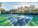 Enjoy a game on the well-maintained tennis courts, perfect for staying active and socializing at 11637 Spindrift Loop, Hudson, FL 34667