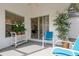 Enclosed patio offers privacy and relaxation with neutral walls and access to the house at 11744 Wheatfield Loop, Hudson, FL 34667