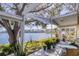 Spacious patio with lake view and plants at 12501 Ulmerton Rd # 19, Largo, FL 33774