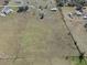 Vast property with well-defined boundaries, showing a home, outbuildings, and open fields at 15111 Peach Bloom Rd, Brooksville, FL 34614