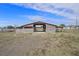 Large barn with an open design, providing ample space for livestock or equipment storage at 15111 Peach Bloom Rd, Brooksville, FL 34614