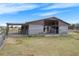 Barn structure with fenced area for livestock, and shaded overhang at 15111 Peach Bloom Rd, Brooksville, FL 34614