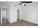 Bedroom with neutral walls, closet and wood-look flooring at 15111 Peach Bloom Rd, Brooksville, FL 34614