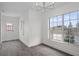A spacious living area with an abundance of natural light showcases the light and airy space at 15111 Peach Bloom Rd, Brooksville, FL 34614