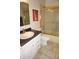 Well-maintained bathroom featuring a sink, toilet, and a shower-tub combination with gold trim at 2164 Vista Del Sol Cir # 505, Lutz, FL 33558