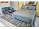 Bedroom with queen bed, sofa, and small table at 2164 Vista Del Sol Cir # 505, Lutz, FL 33558