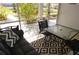 Relaxing lanai with table, chairs, and sofa at 2164 Vista Del Sol Cir # 505, Lutz, FL 33558