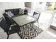 Relaxing lanai with table, chairs, and sofa at 2164 Vista Del Sol Cir # 505, Lutz, FL 33558